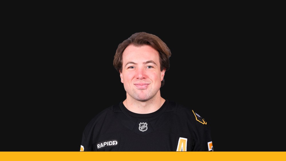 Charlie McAvoy in his Bruins uniform